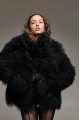 Women's black sheepskin coat made of natural llama